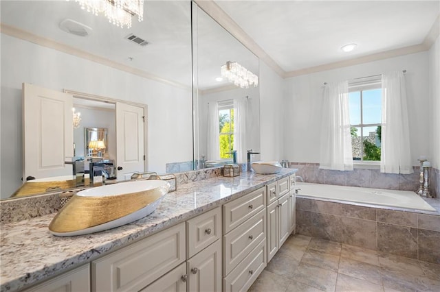 bathroom featuring vanity, tiled bath, a notable chandelier, and tile patterned floors