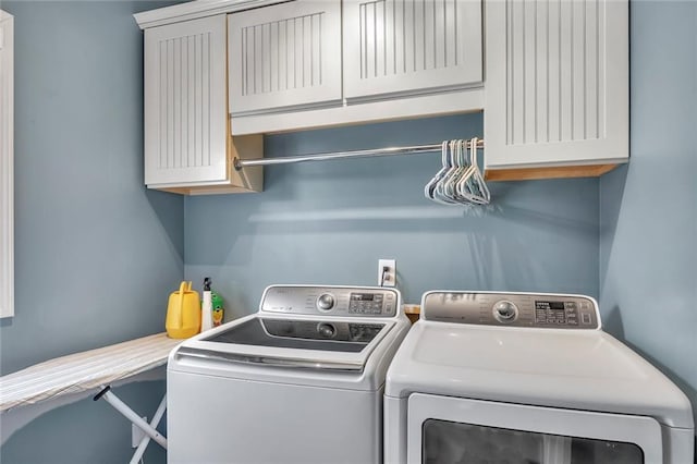 225 Ruby Forest Pkwy, Suwanee, GA 30024 - laundry area with washer and dryer and cabinet space