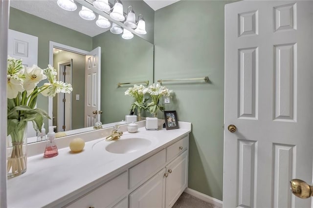 225 Ruby Forest Pkwy, Suwanee, GA 30024 - bathroom featuring vanity and baseboards