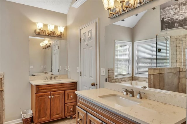 225 Ruby Forest Pkwy, Suwanee, GA 30024 - bathroom with a chandelier, two vanities, vaulted ceiling, a garden tub, and tile patterned floors