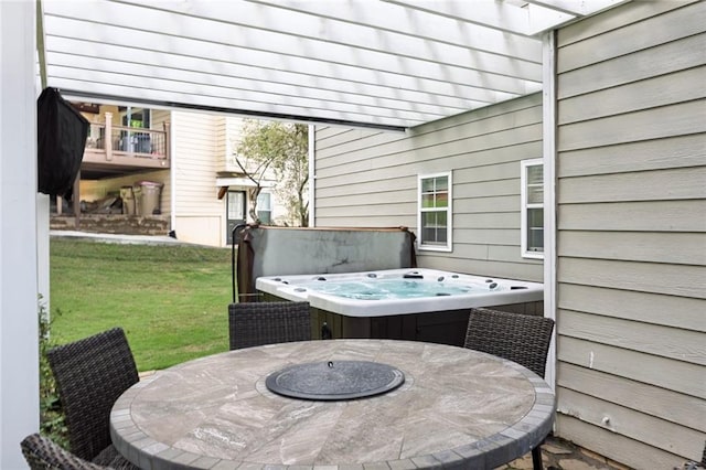 225 Ruby Forest Pkwy, Suwanee, GA 30024 - view of patio featuring a hot tub and outdoor dining space