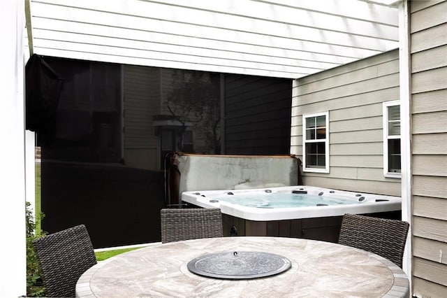 225 Ruby Forest Pkwy, Suwanee, GA 30024 - view of patio / terrace with outdoor dining space and a hot tub