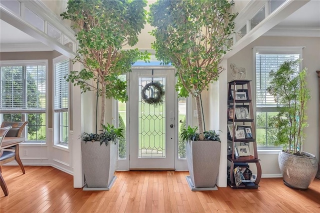 225 Ruby Forest Pkwy, Suwanee, GA 30024 - entryway with hardwood / wood-style flooring and crown molding