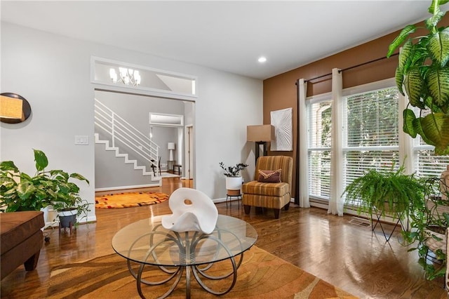 living area with dark hardwood / wood-style flooring