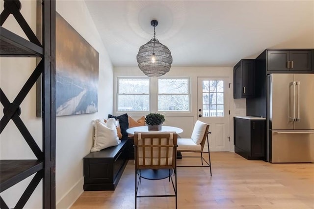 dining area with light hardwood / wood-style floors