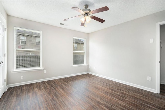 222 Ben Ln, Fairburn, GA 30213 - unfurnished room featuring wood finished floors, a ceiling fan, baseboards, and a textured ceiling