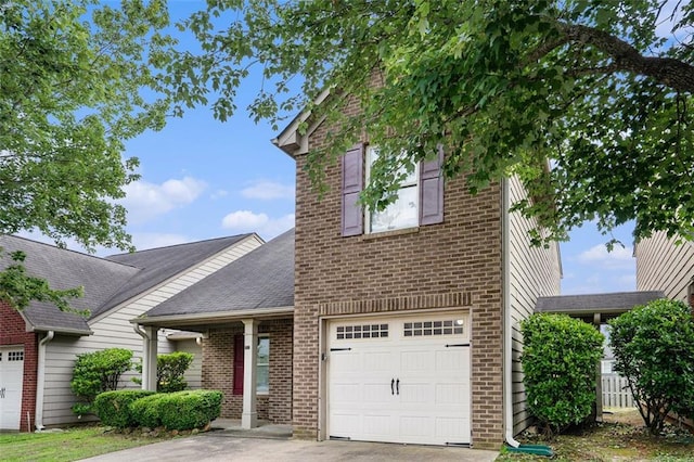 222 Ben Ln, Fairburn, GA 30213 - view of front of home featuring brick siding, a garage, driveway, and a shingled roof