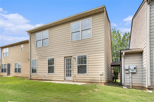222 Ben Ln, Fairburn, GA 30213 - rear view of house featuring a yard