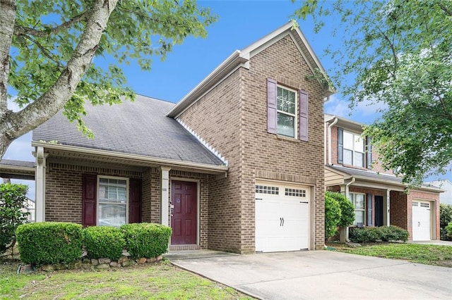 222 Ben Ln, Fairburn, GA 30213 - traditional home featuring brick siding, concrete driveway, and a garage