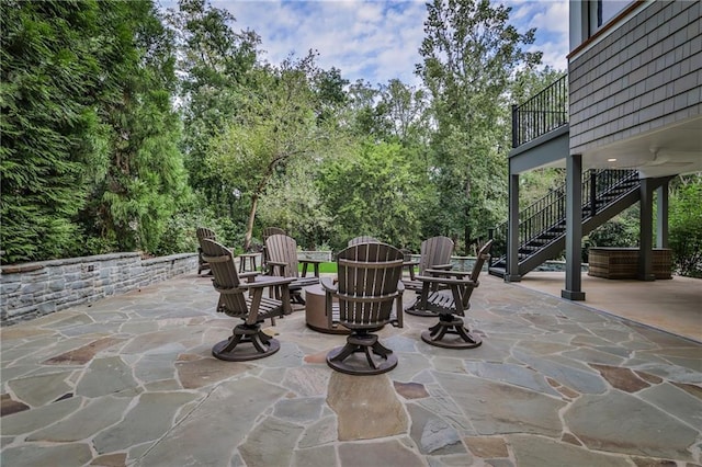 1658 E Clifton Rd NE, Atlanta, GA 30307 - view of patio featuring stairway and a fire pit