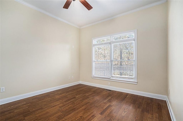 spare room with ceiling fan, dark hardwood / wood-style floors, and ornamental molding