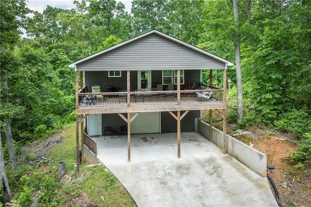 2801 Henderson Mountain Rd, Jasper, GA 30143 - rustic home featuring an attached garage, driveway, and a wooden deck