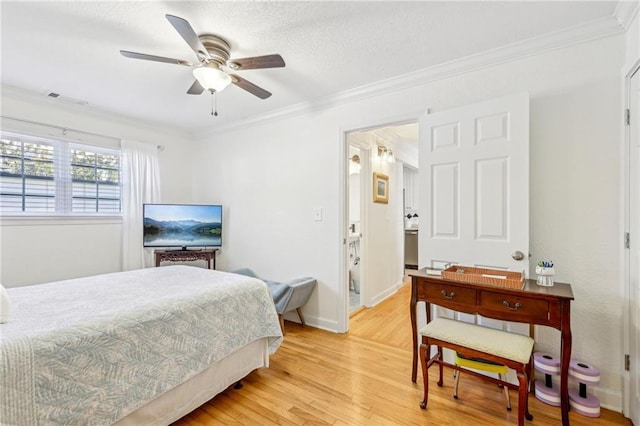 bedroom featuring ceiling fan, crown molding, and light hardwood / wood-style floors