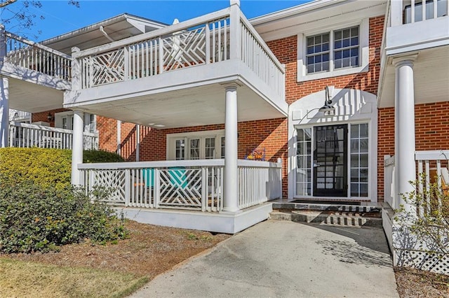 rear view of house with a balcony