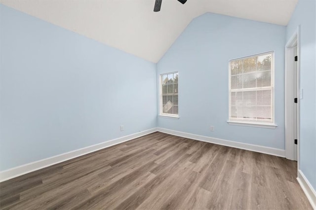 spare room featuring a healthy amount of sunlight and light wood-type flooring