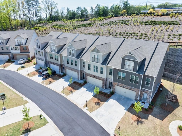 drone / aerial view with a residential view