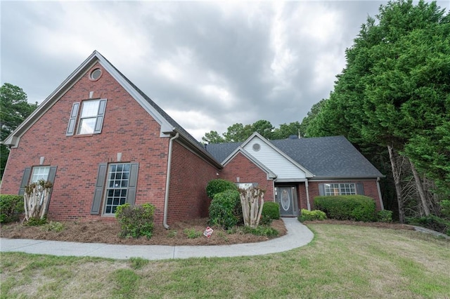 1200 Martins Chapel Ln SE, Lawrenceville, GA 30045 - traditional-style house with brick siding and a front yard
