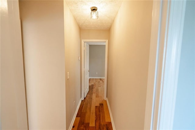 1200 Martins Chapel Ln SE, Lawrenceville, GA 30045 - hall with wood finished floors and a textured ceiling