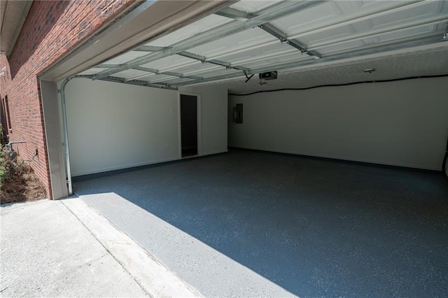 1200 Martins Chapel Ln SE, Lawrenceville, GA 30045 - garage featuring a garage door opener and electric panel