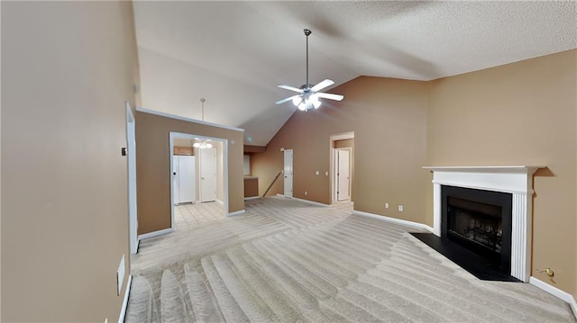 unfurnished living room featuring ceiling fan, light colored carpet, a textured ceiling, and high vaulted ceiling