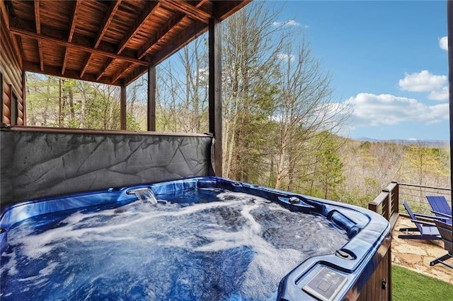 exterior details featuring a jacuzzi