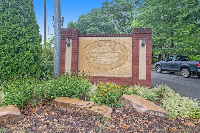 view of community sign