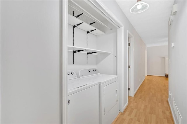 1341 Little Deer Run, Canton, GA 30114 - laundry room with washing machine and dryer and light wood-style floors