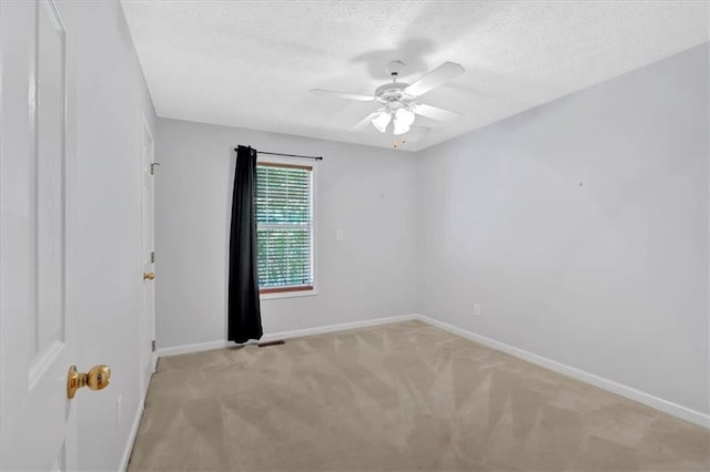 1341 Little Deer Run, Canton, GA 30114 - spare room featuring ceiling fan, light carpet, and a textured ceiling