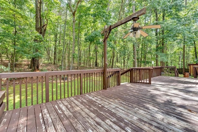 1341 Little Deer Run, Canton, GA 30114 - wooden deck with a ceiling fan, a lawn, and a forest view
