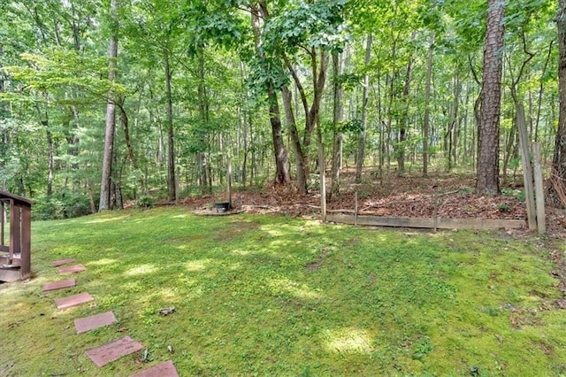 1341 Little Deer Run, Canton, GA 30114 - view of grassy yard with a forest view
