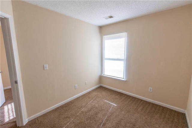 1830 Bayrose Cir Unit 30B, East Point, GA 30344 - spare room featuring carpet flooring, baseboards, plenty of natural light, and visible vents