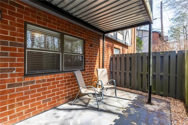 view of patio with fence