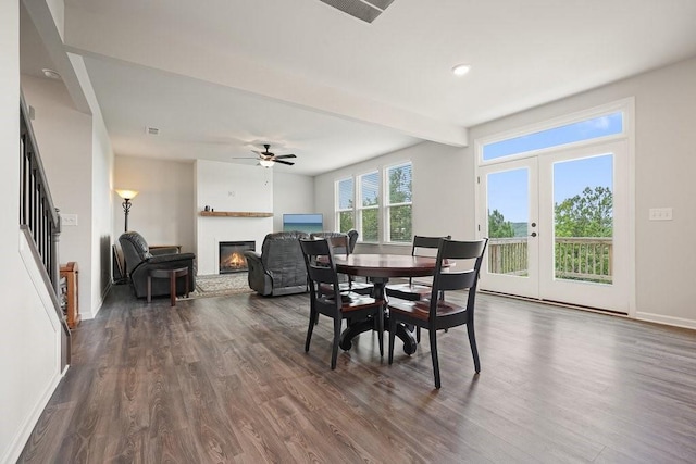 dining space featuring ceiling fan, dark hardwood / wood-style floors, and french doors