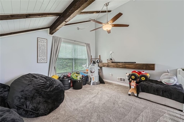 interior space featuring visible vents, ceiling fan, vaulted ceiling with beams, wooden ceiling, and carpet