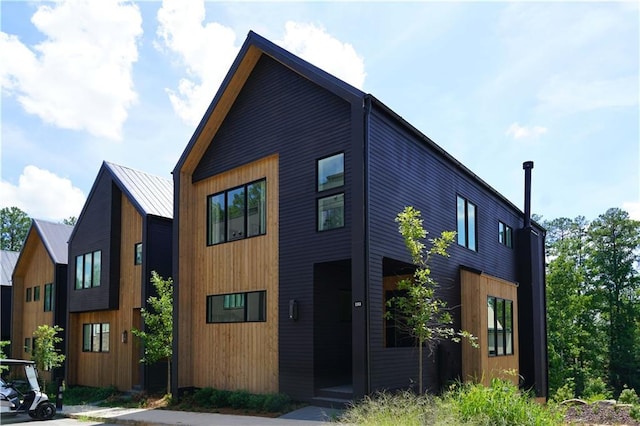 1168 Mado Loop, Chattahoochee Hills, GA 30268 - modern home featuring metal roof