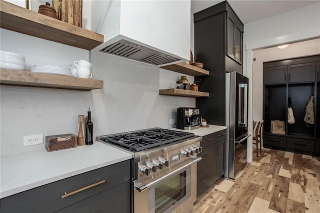 1168 Mado Loop, Chattahoochee Hills, GA 30268 - kitchen with open shelves, premium range hood, high quality appliances, and light wood-style floors