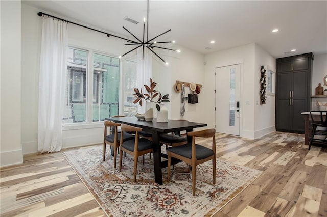 1168 Mado Loop, Chattahoochee Hills, GA 30268 - dining room featuring light wood finished floors, a chandelier, recessed lighting, and baseboards