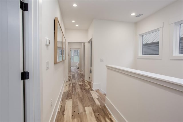 1168 Mado Loop, Chattahoochee Hills, GA 30268 - hallway featuring light wood finished floors, recessed lighting, an upstairs landing, and baseboards