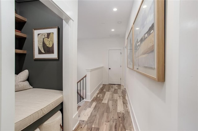 1168 Mado Loop, Chattahoochee Hills, GA 30268 - hall featuring light wood-style flooring, recessed lighting, an upstairs landing, and baseboards