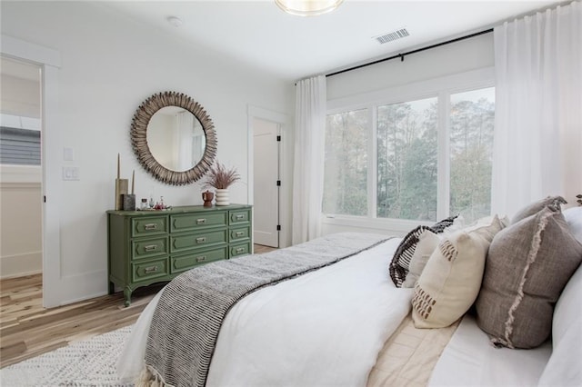 1168 Mado Loop, Chattahoochee Hills, GA 30268 - bedroom featuring light wood-type flooring and baseboards