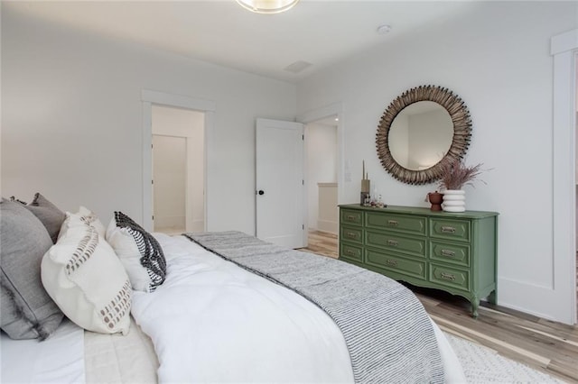 1168 Mado Loop, Chattahoochee Hills, GA 30268 - bedroom featuring light wood-style flooring and baseboards