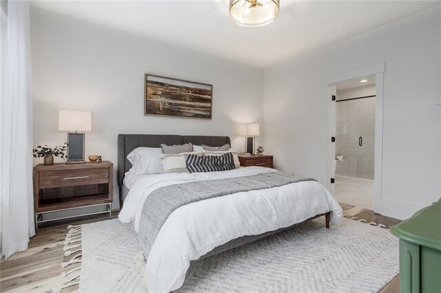 1168 Mado Loop, Chattahoochee Hills, GA 30268 - bedroom featuring light wood finished floors and ensuite bathroom