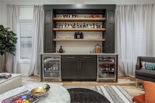 1168 Mado Loop, Chattahoochee Hills, GA 30268 - indoor dry bar with wine cooler and light wood-style flooring