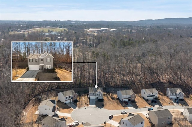 4770 Alford Commons, Cumming, GA 30028 - aerial view of property and surrounding area featuring property parcel outlined, nearby suburban area, and a heavily wooded area