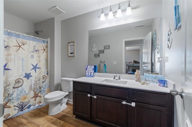 4770 Alford Commons, Cumming, GA 30028 - bathroom featuring vanity, toilet, wood finished floors, and a shower with curtain