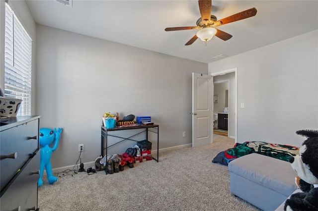 rec room featuring ceiling fan and light colored carpet