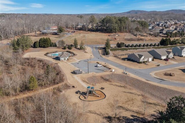 drone / aerial view featuring a mountain view