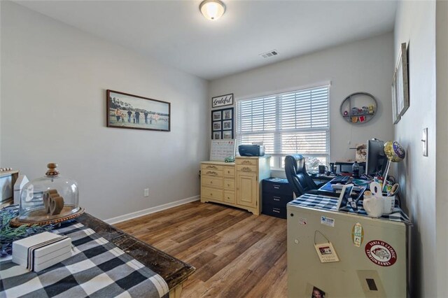 office space featuring hardwood / wood-style floors