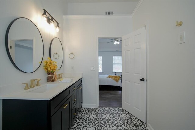 bathroom with tile walls, a bathtub, vanity, toilet, and an inviting chandelier