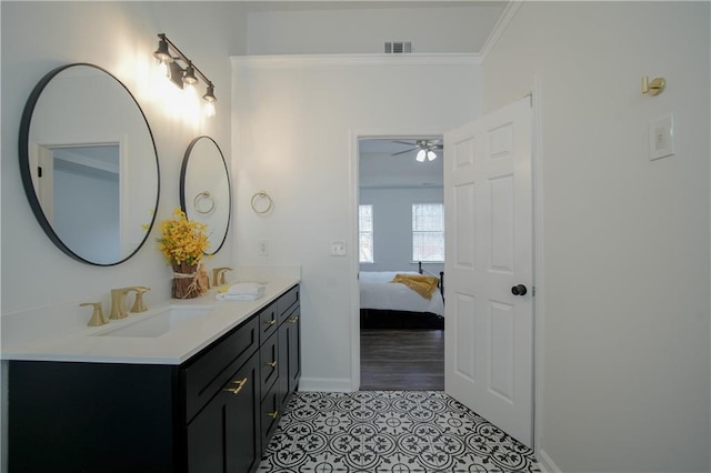 bathroom with vanity, tile patterned floors, and ornamental molding